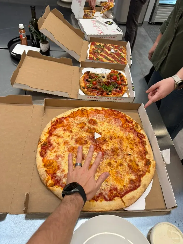 A selection of pizzas at the office